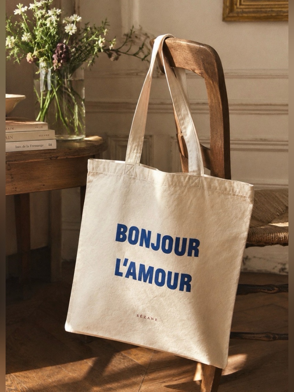 Sézane organic cotton Bonjour l’amour tote, beige with blue and red wording